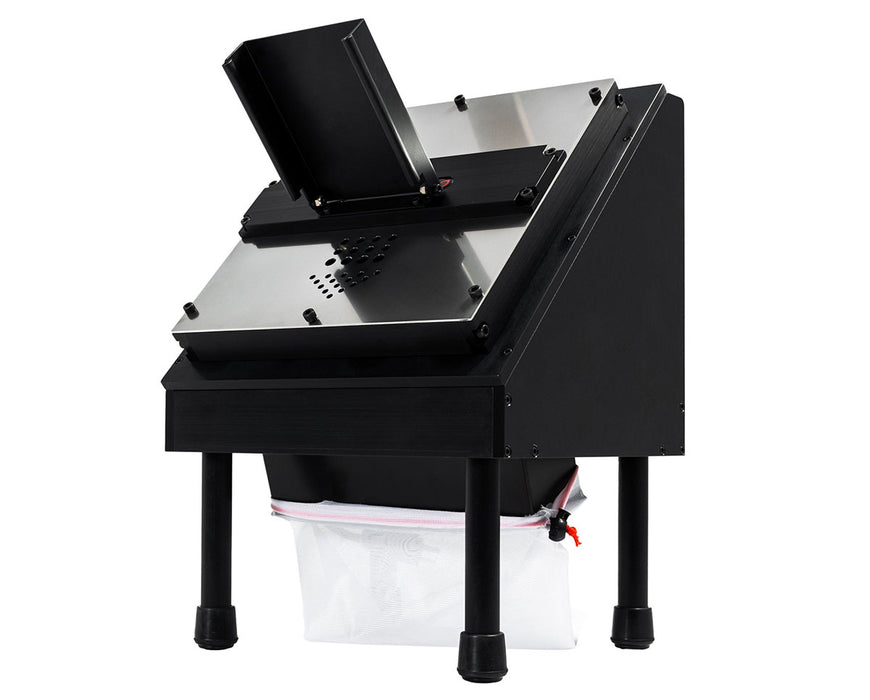 This angled back view of the GC Mini Bucker shows the trimming bag in place beneath the machine.