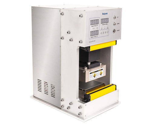 Angled view of Dulytek DE10K showing stainless steel housing, LED display, and precision-aligned heat plates.