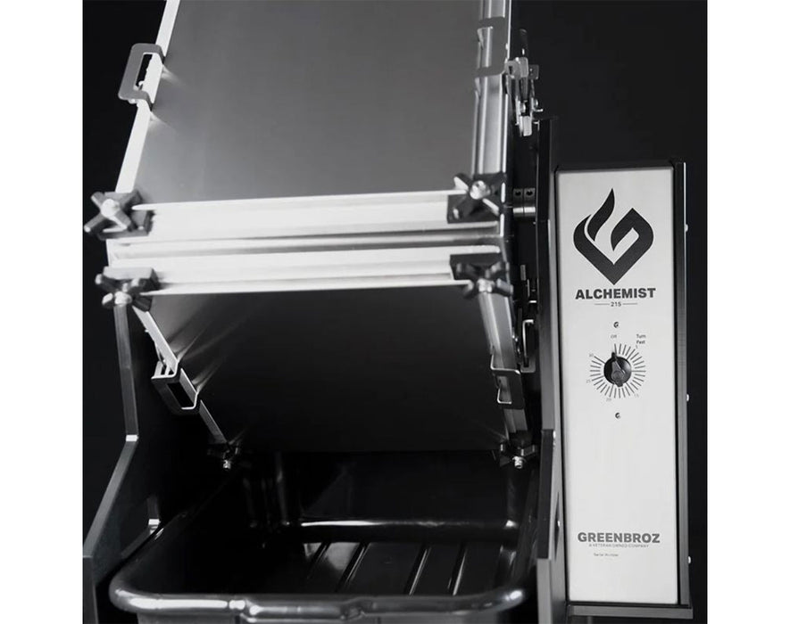 Side angle of the Alchemist 215 Trichome Extractor showing control dial and open drum for kief collection.