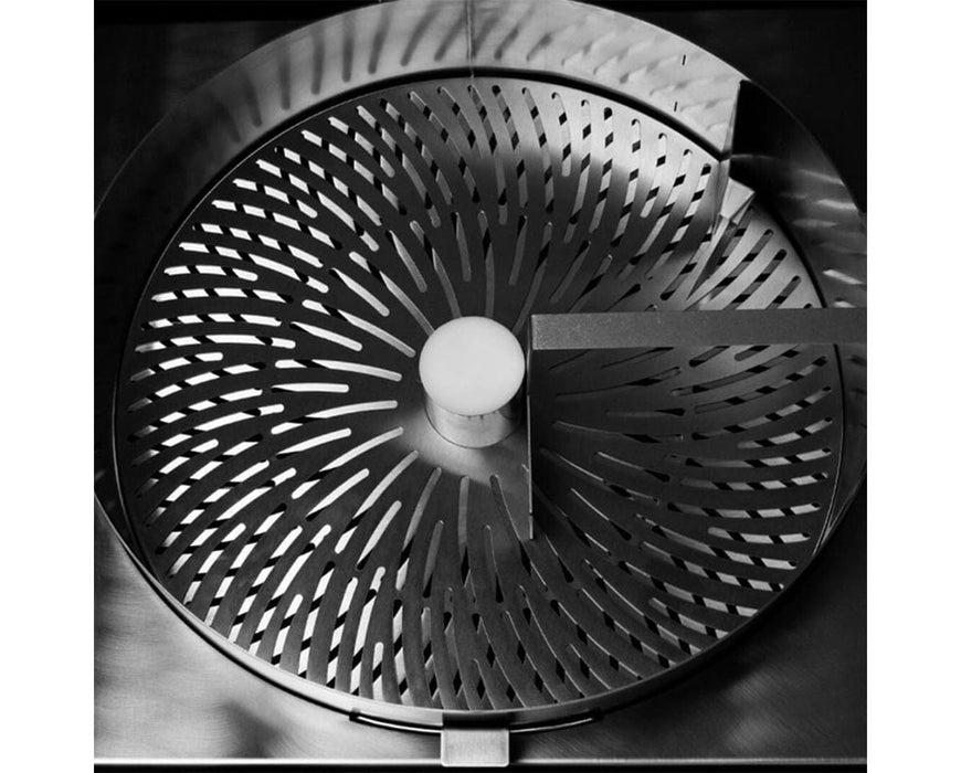 Overhead view of GreenBroz M+ Trimming System’s trimming surface with spiral slotted blade design for efficient dry trimming.