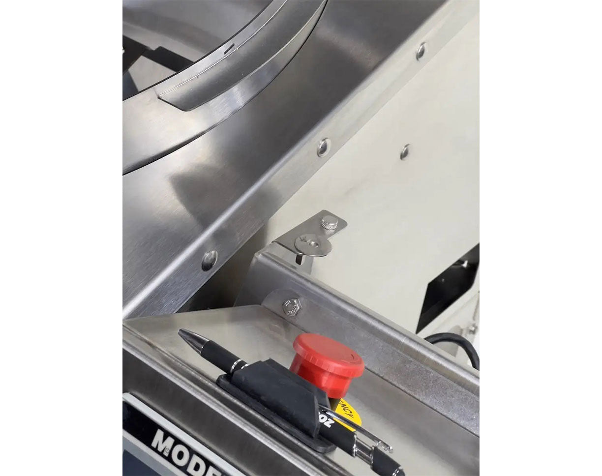 Image showing the GreenBroz Model M cannabis trimmer's emergency stop button.