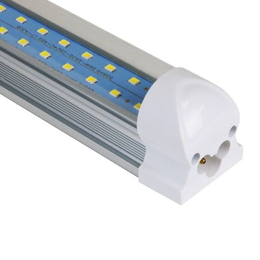 Close-up of Lightech T8 LED 4-foot grow light showing blue PCB, yellow diodes, and white end cap.