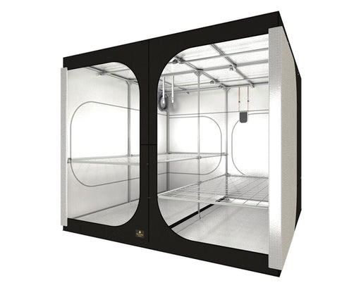 Large grow tent with dual compartments, reflective mylar interior, and wire shelving for hydroponic or soil cultivation.