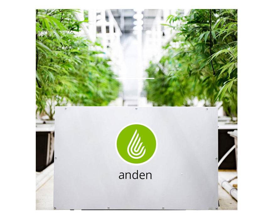Anden A210V1 dehumidifier in a commercial grow room, positioned on the floor with cannabis plants in the background.