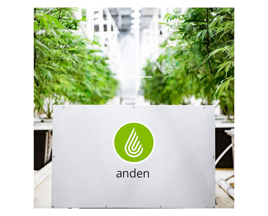 Anden A320V1 dehumidifier in a commercial grow room, positioned on the floor with cannabis plants in the background.