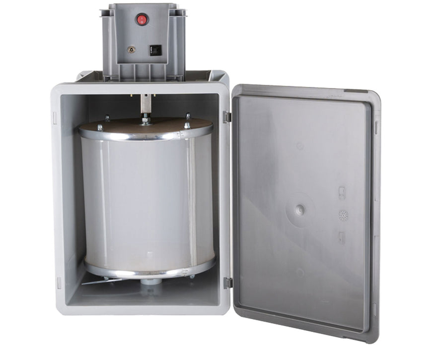 Inside view of the Bubble Magic Pollen Tumbler showing the cylindrical mesh drum enclosed in a protective gray housing with open door access.