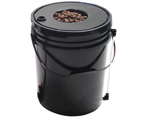 Black 5-gallon hydroponic bucket with a lid containing clay pebbles and a clear water level indicator tube attached to the side.
